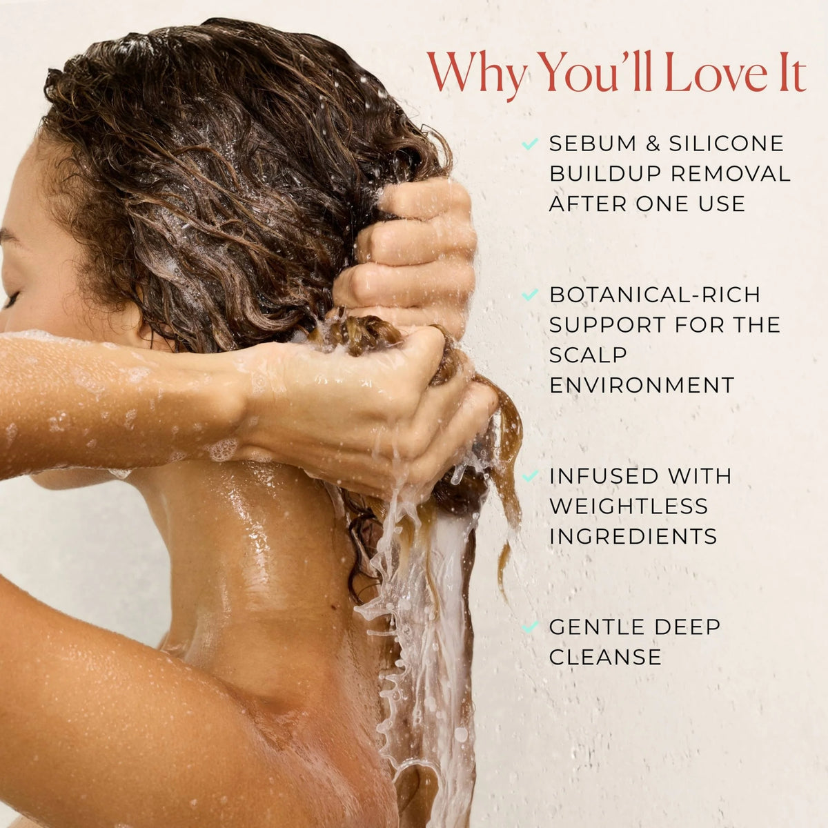 Woman rinsing hair with water, demonstrating clarifying shampoo that removes sebum and silicone buildup with botanical ingredients for scalp health.